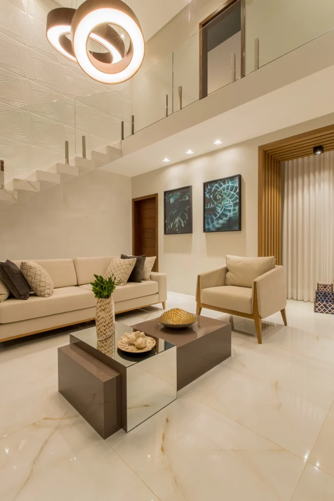 Living room with marble and double-height ceiling with Accord pendant